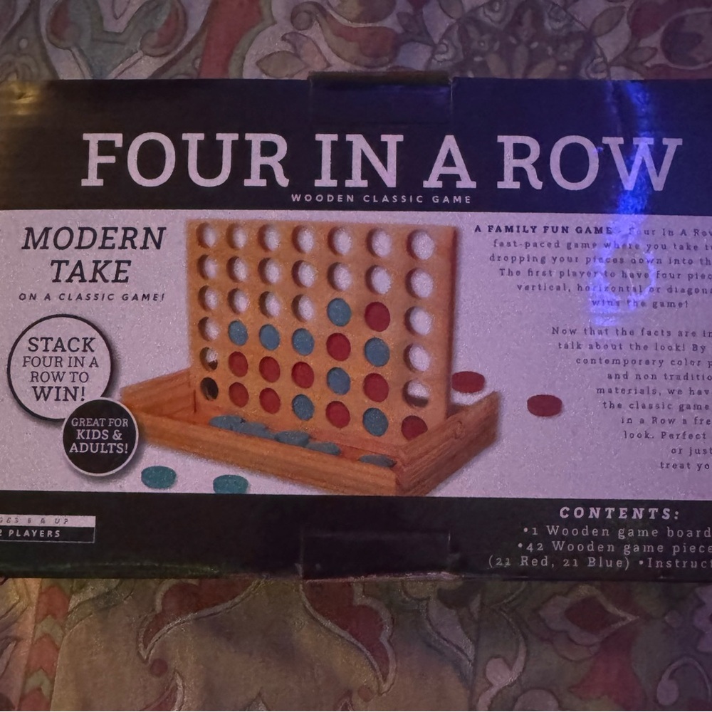 Bring the fun home! Our classic wooden Four in a Row